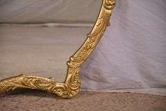 Large dresser mirror with ornate gold painted frame; 55-12164E