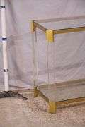 Lucite and gold metal console table with glass top and shelf; 74-12880