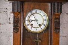 Vintage wall clock with carved walnut case; 18305-031