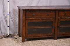 Pottery Barn distressed entertainment credenza with 2 drop-front drawers and 2 glass doors; 55-12263