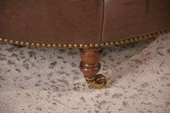 Round tufted leather ottoman; 55-12251
