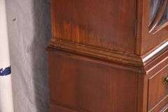 Crotch mahogany 2 part bubble glass breakfront; 74-12886