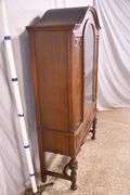 Walnut china cabinet with 1 glass door and 1 drawer; 74-12844