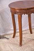 Round side table with carved skirt; 1153-096