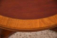 Kindel round inlaid mahogany coffee table; 4779-003