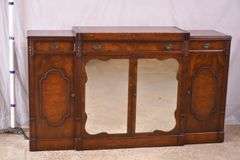 Mahogany credenza with leather top and mirrored doors; 21-2704