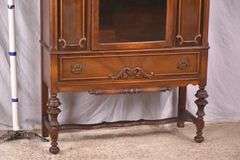 Walnut china cabinet with 1 glass door and 1 drawer; 74-12844