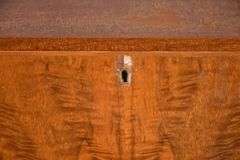Burl walnut slant-front desk with ball in claw feet; 55-12174