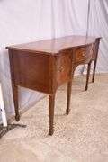 Inlaid crotch mahogany serpentine front sideboard; 74-12887