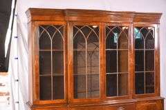 Crotch mahogany 2 part bowfront breakfront; 55-12189