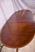 Oval mahogany double pedestal dining table with 3 leaves; 18301-001