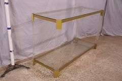 Lucite and gold metal console table with glass top and shelf; 74-12880