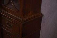 Crotch mahogany 2 part bubble glass breakfront; 74-12886