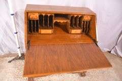Burl walnut slant-front desk with ball in claw feet; 55-12174