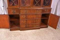 Crotch mahogany 2 part bubble glass breakfront; 74-12886