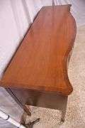 Inlaid crotch mahogany serpentine front sideboard; 74-12887