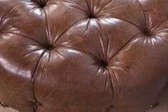 Round tufted leather ottoman; 55-12251
