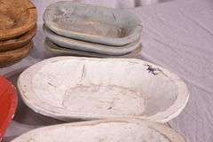 Group of 17 hand carved wooden bowls; 1037-1161