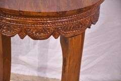 Round side table with carved skirt; 1153-096