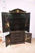 Black and gold Oriental decorated 2 part armoire with fitted interior; 55-12157