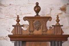 Vintage wall clock with carved walnut case; 18305-031