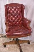 Burgundy tufted vinyl desk chair with swivel tilting seat; 74-12885
