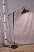 Black metal floor lamp with adjustable arm; 1153-094