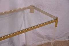 Lucite and gold metal console table with glass top and shelf; 74-12880