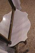Black and gold mirror with low marble top console table; 55-12187