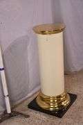 Off-white pedestal with brass caps; 55-12265