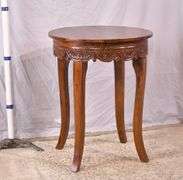 Round side table with carved skirt; 1153-096