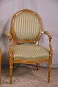 Pair of carved French style open armchairs; 55-12305