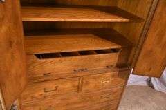 Henredon "Artefacts" oak armoire with fitted interior; 55-12171