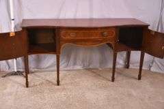 Inlaid crotch mahogany serpentine front sideboard; 74-12887