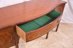 Inlaid crotch mahogany serpentine front sideboard; 74-12887