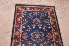 2.7'x7.9' hand knotted rug/runner with blue field; 5038-004