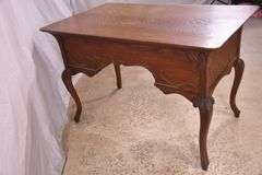 Carved oak 4 drawer writing desk; 55-12158