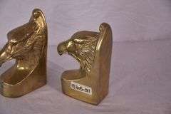 Pair of brass eagle head bookends; 18305-011