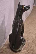 Plaster dog statue; 336-4569
