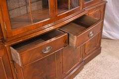 Crotch mahogany 2 part bowfront breakfront; 55-12189
