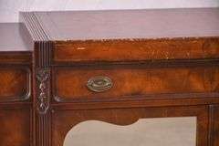 Mahogany credenza with leather top and mirrored doors; 21-2704