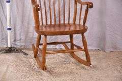 Nichols & Stone spindle back rocker with carved seat; 1152-102