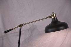 Black metal floor lamp with adjustable arm; 1153-094