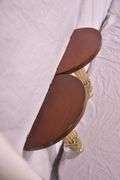 Pair of half-round gold metal and wood wall sconce shelves; 16721-059