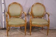 Pair of carved French style open armchairs; 55-12305