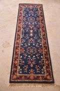 2.7'x7.9' hand knotted rug/runner with blue field; 5038-004