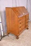 Burl walnut slant-front desk with ball in claw feet; 55-12174