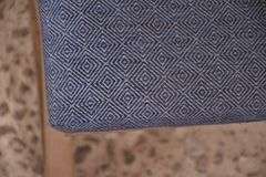 Distressed "X" base bench with blue fabric seat; 336-4578
