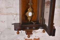 Vintage wall clock with carved walnut case; 18305-031