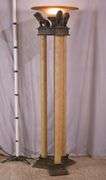 Large 3 column floor lamp with amber shade and lion figures on top; 74-12849